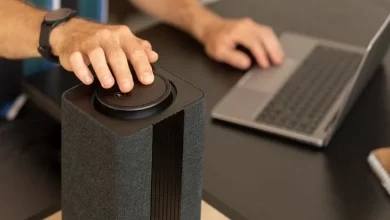 what is a soundbar slim speaker system below flat screen TV on entertainment center