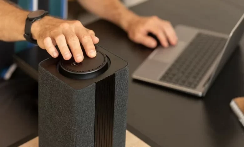 what is a soundbar slim speaker system below flat screen TV on entertainment center