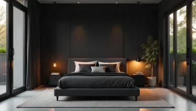 Black Gray Bedroom Ideas featuring a modern bedroom with charcoal walls, gray bedding, black accent furniture, and soft ambient lighting.