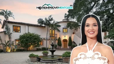 Front view of the Katy Perry House in Montecito, showcasing Spanish-style architecture, lush gardens, and elegant outdoor living spaces.