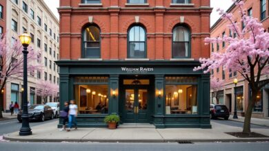 William Raveis Real Estate office on a city corner with cherry blossom trees, showcasing the brand’s welcoming and professional atmosphere.