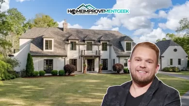 Front view of the luxury Tudor-style Kyle Jacobs House in Nashville, showing elegant design, lush landscaping, and the home’s stately entrance.