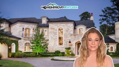 LeAnn Rimes House exterior featuring Hidden Hills luxury mansion with rustic design elements and private grounds.RetryClaude can make mistakes. Please double-check responses.