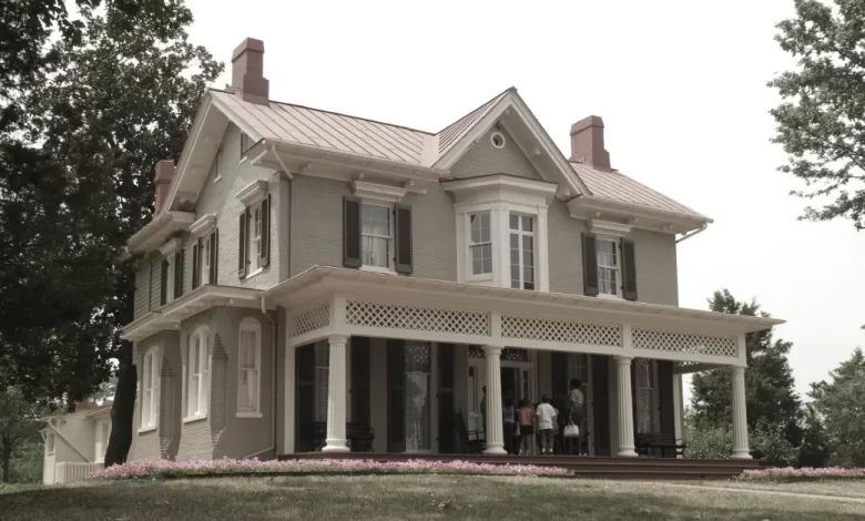 The Frederick Douglass House: Your Complete Guide to America's Most Inspiring Historic Home - Luxury Real Estate | HomeImprovementGeek Frederick Douglass House at Cedar Hill - historic Victorian home with white columns and wraparound porch in Washington DC