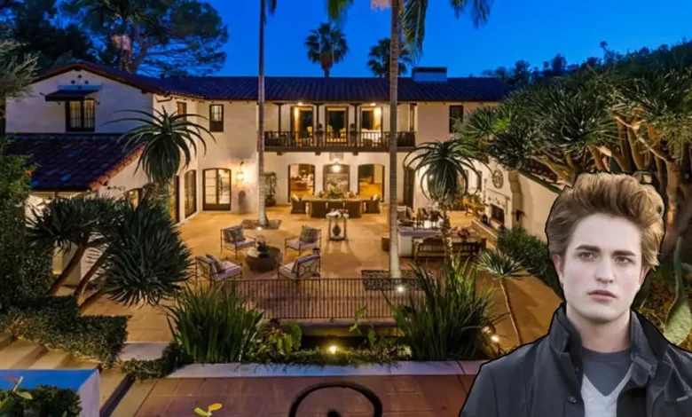 Robert Pattinson house Hollywood Hills Spanish Colonial luxury estate with outdoor patio and palm trees at night