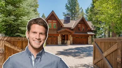 Daniel Tosh House Lake Tahoe exterior showing main residence with dark wood shingles stone accents mountain backdrop