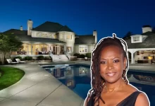 Robin Quivers house exterior view showing New Jersey waterfront estate with private dock and canal access