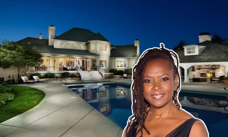 Robin Quivers house exterior view showing New Jersey waterfront estate with private dock and canal access