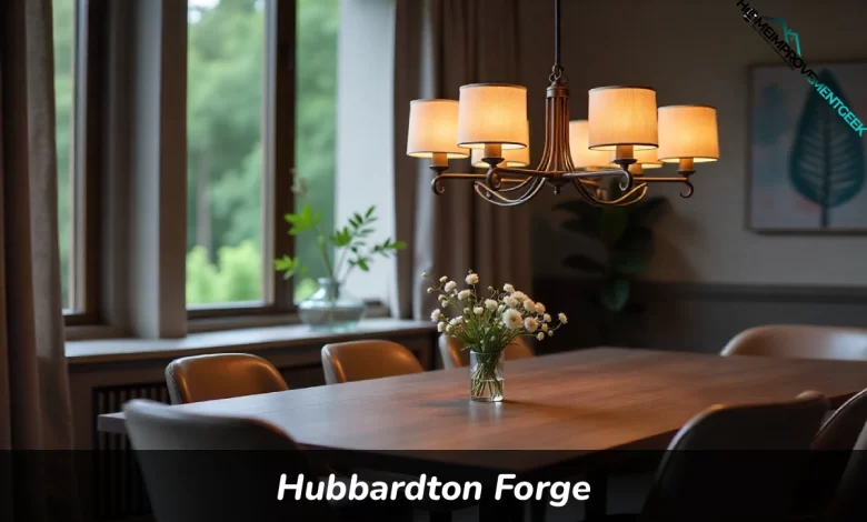 Hubbardton Forge handcrafted chandelier hanging over dining table showing wrought iron metalwork and bronze finish