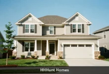HHHunt Homes new construction single family house with front porch and landscaped yard in Virginia community
