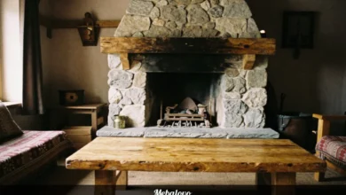 Mebalovo home design living room with wooden beams natural stone fireplace and rustic furniture