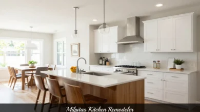 Modern Milpitas kitchen remodel with white cabinets, quartz countertops, and island seating by professional kitchen remodeler