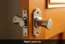 Night latch lock installed on wooden front door showing cylinder key entry and interior handle mechanism