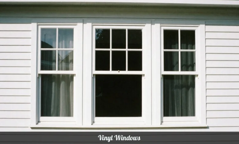 White vinyl windows installed on modern home exterior showing double-hung style with energy efficient glass panes