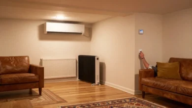 Basement heating methods comparison showing mini-split heat pump and baseboard heaters in finished basement with warm comfortable temperature