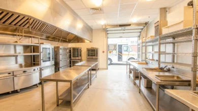 Inside view of a licensed commissary kitchen with stainless steel equipment and prep tables