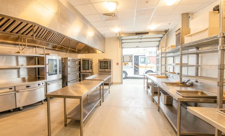 What Is a Commissary Kitchen? Cost, Types & How to Find One - Kitchen | HomeImprovementGeek Inside view of a licensed commissary kitchen with stainless steel equipment and prep tables