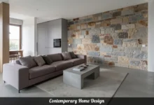 Contemporary home design living room with open floor plan, large windows, and natural wood and stone finishes