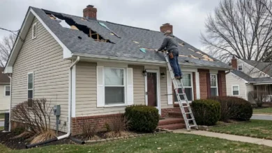 Homeowner exploring roof financing in Cedar Rapids after storm damage to residential roof