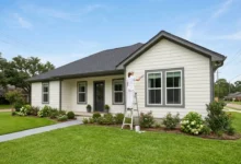 NELA Painting & Reno crew painting the exterior of a home in West Monroe LA