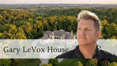 Gary LeVox House: Inside the Rascal Flatts Star's $4.4M Nashville Estate and 2,000-Acre Retreat - Luxury Real Estate | HomeImprovementGeek Gary LeVox's Nashville mansion exterior with Romanesque architecture surrounded by Tennessee forest.