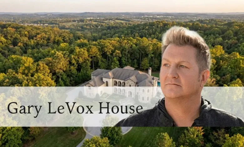 Gary LeVox House: Inside the Rascal Flatts Star's $4.4M Nashville Estate and 2,000-Acre Retreat - Luxury Real Estate | HomeImprovementGeek Gary LeVox's Nashville mansion exterior with Romanesque architecture surrounded by Tennessee forest.