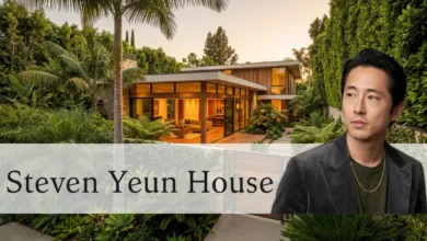 Steven Yeun house exterior — mid-century modern home in Pasadena with tropical garden and private gated entry