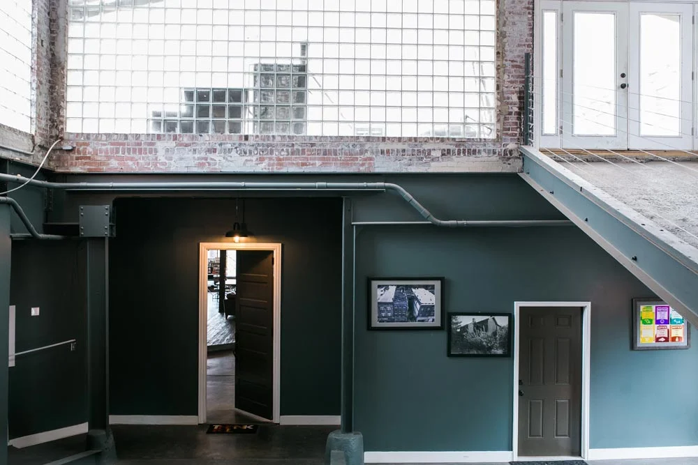 Interior ramp glass-block wall and exposed structure in the Fetterman loft